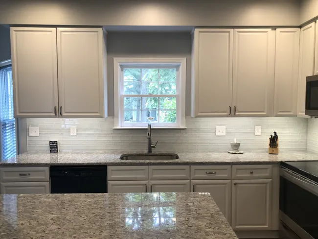 New Cabinets, Counters And Flooring To Brighten The Space