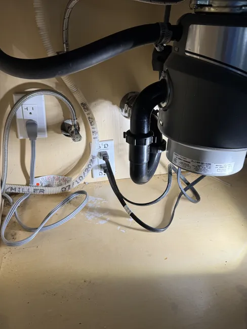 A clogged kitchen drain was swiftly cleared, and new components replaced to ensure lasting functionality.