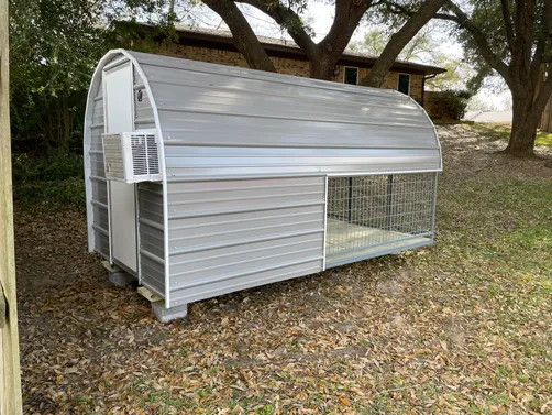 photo at Mineola, TX on Jan 13, 2026: 6x10 deluxe dog kennel in pewter gray with white trimfully enclosed back room includes: solid floo