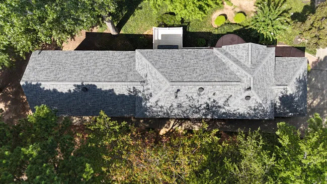 We installed Owens Corning Duration shingles in Estate Gray, enhancing curb appeal with a durable roof replacement.