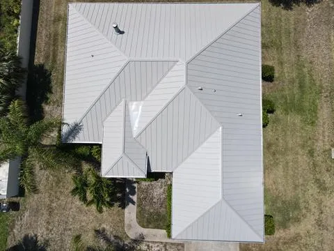 Shingle To Standing Seam Metal