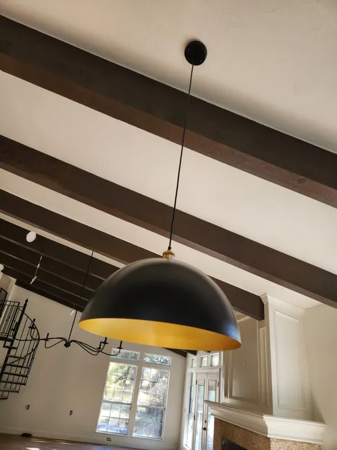 New, modern lighting fixtures were installed to elevate the homeowner's space, blending style with functionality.