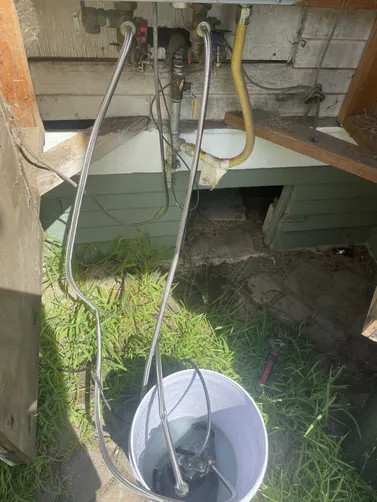 photo at Martinez, CA on Apr 10, 2026: The bathroom sink faucet was leaking and required repair. We successfully descaled the tankless wat