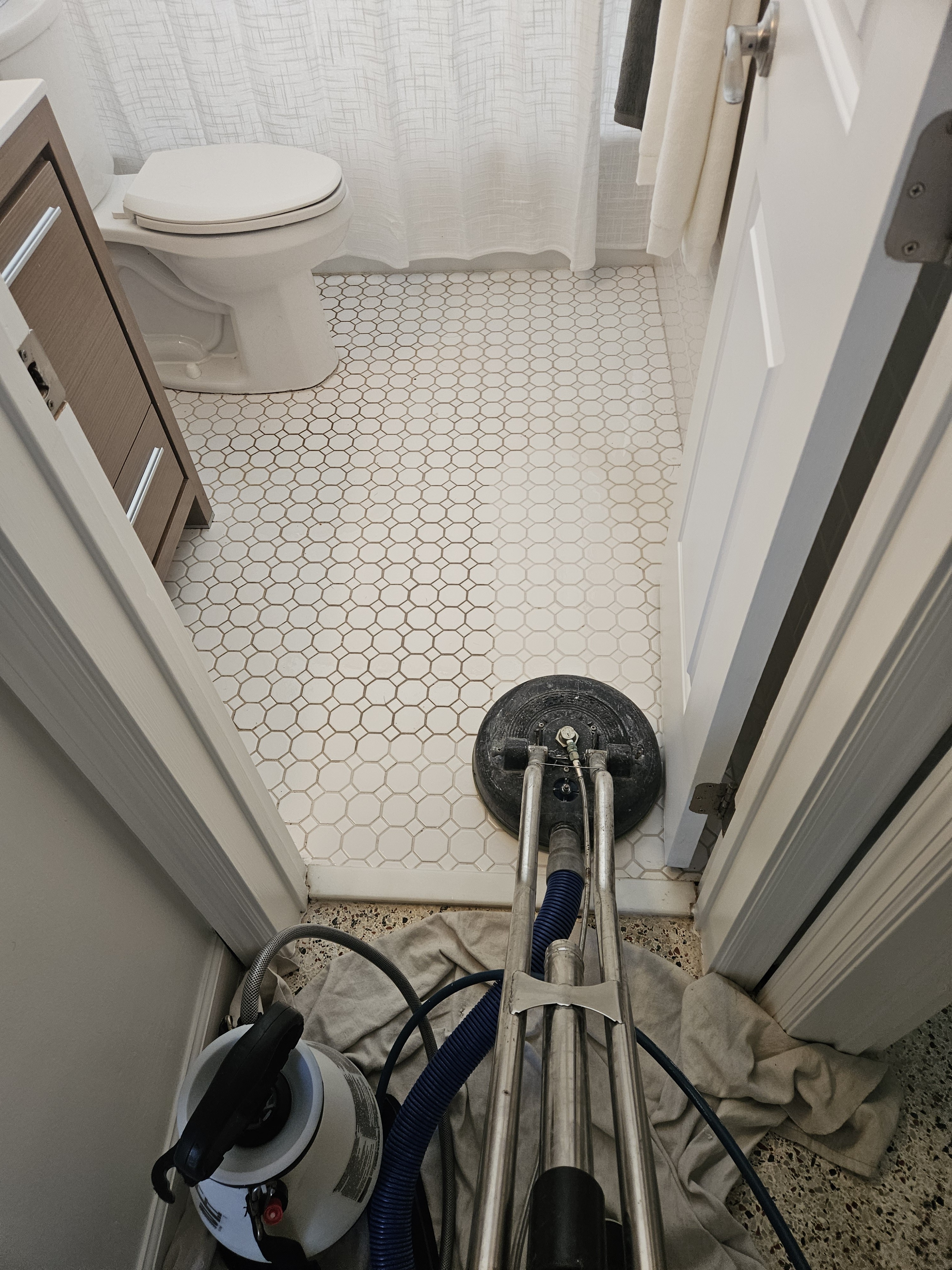 Bathroom floor tile cleaned by Superclean Services in Palm Beach County
