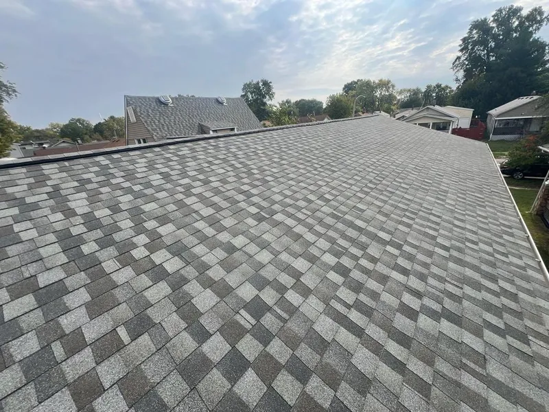 6-inch white gutters installed with a new roof in Granite City, IL