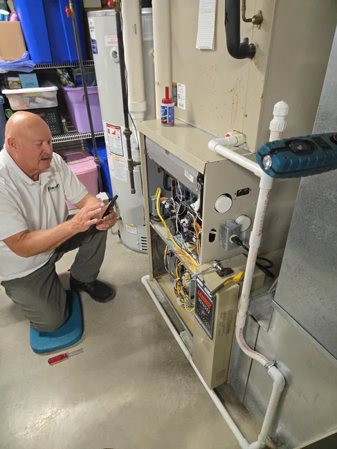 Looking up a part number for a gas valve that is needed to repair the furnace
