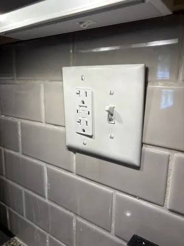 After identifying a malfunctioning GFCI outlet, we promptly replaced it to ensure the safety and functionality of the electrical system. This service was essential for their space, providing reliable power where needed.