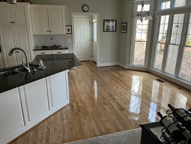 This project involved sanding and finishing a hardwood floor, resulting in a stunning, revitalized living space.