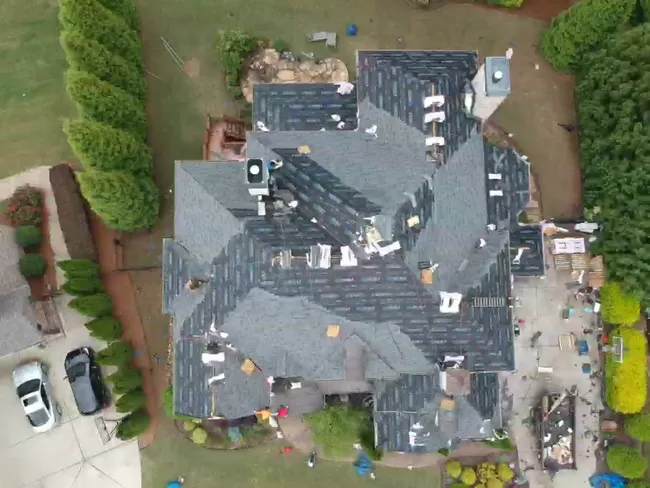 Check out the beautiful line work on a new roof we installed in Suwanee. These pictures really show the attention  to detail our workers command. 
