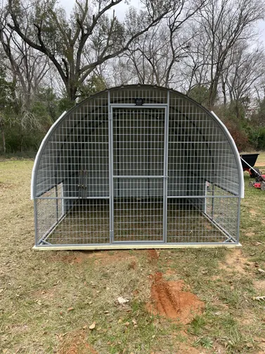 photo at Frankston, TX on Dec 23, 2025: 10x12 enclosed animal shelter in pewter grayMade with a welded frame and horse grade ag panel- tre