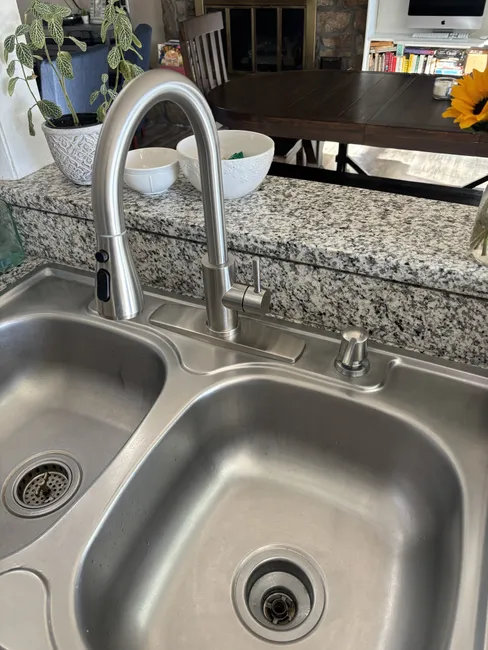 A new faucet was seamlessly installed in a McDonald residence, enhancing both style and kitchen efficiency.